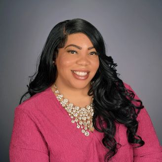 Ashley Mundon-Barrett, Our Center Director